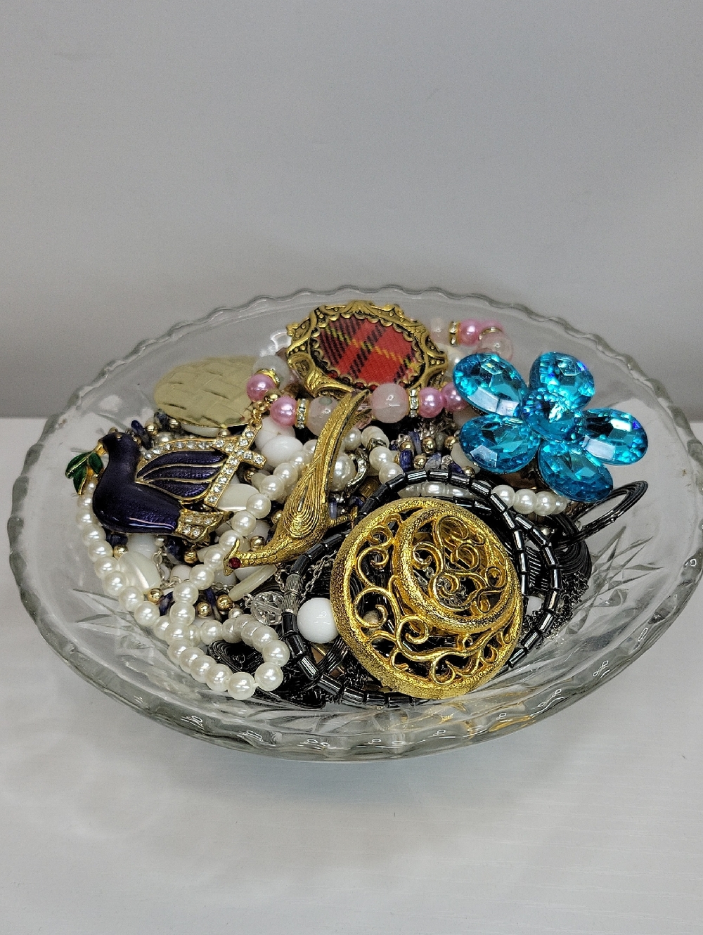 Assorted Women's Jewelry In A Glass Dish
